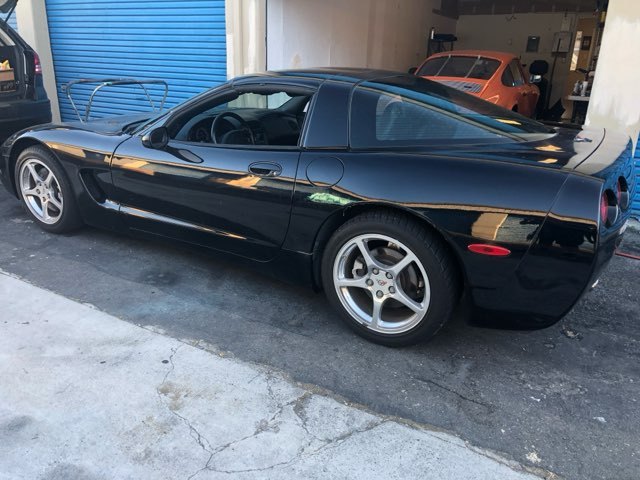 Black second-generation Chevrolet Camaro with stripes